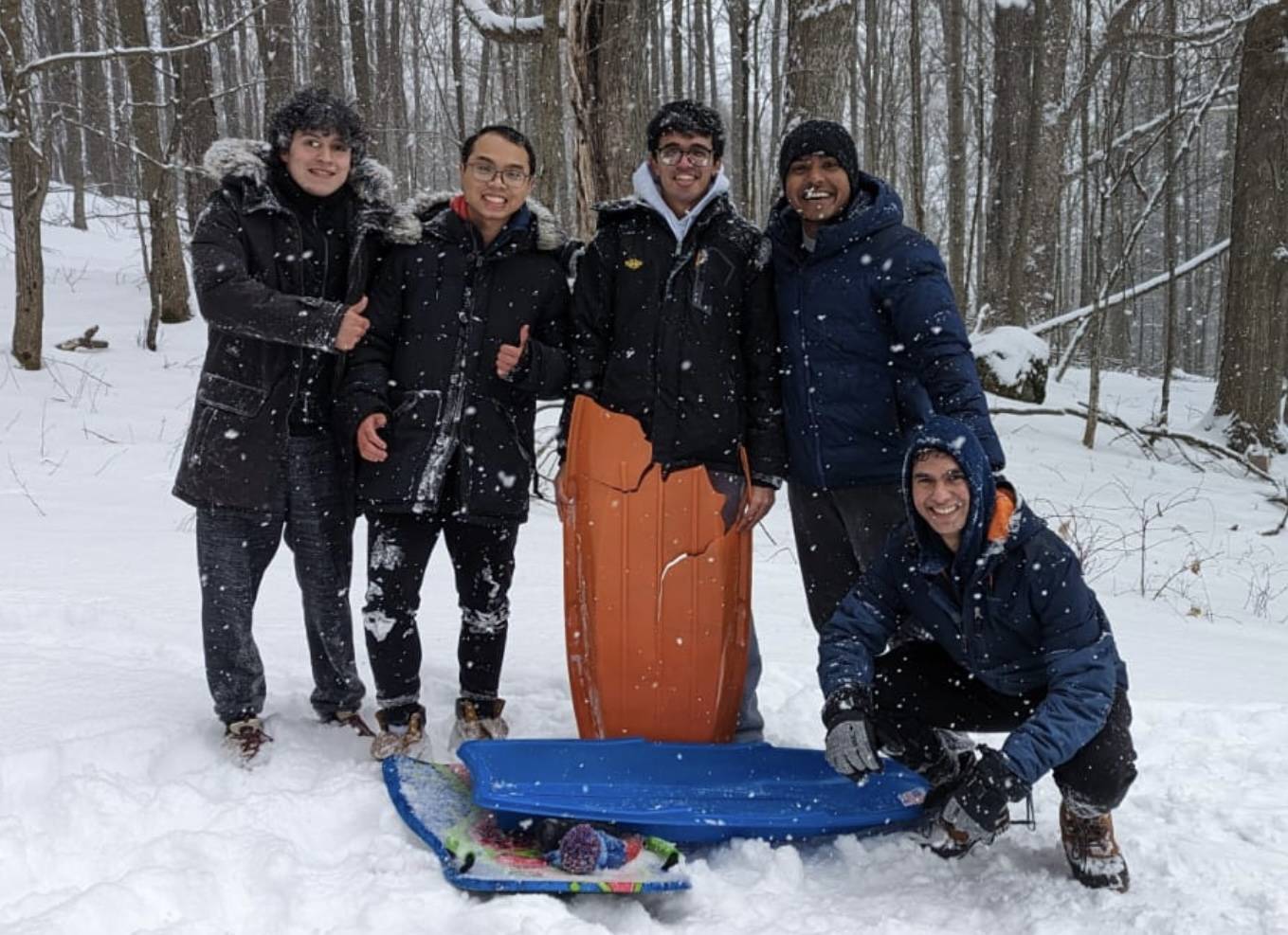 Nilesh and friends enjoying a fresh snowfall on campus