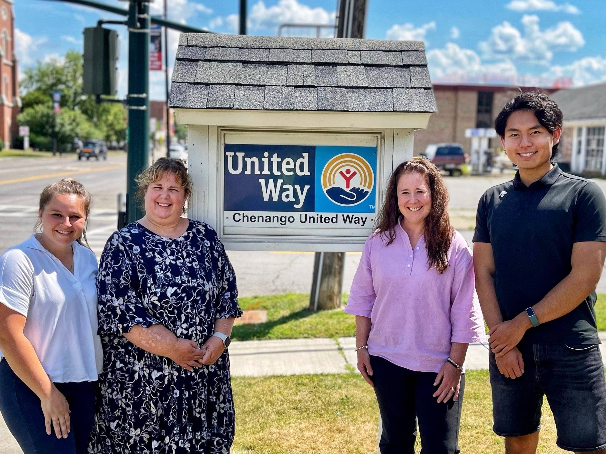 Chenango United Way staff members Kyli Anderson, Victoria Mitchell and Elizabeth Monaco join David Xiu at the organization's Norwich office.