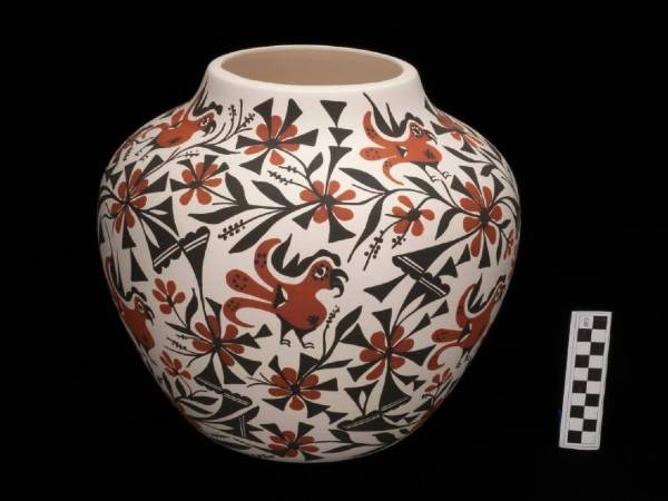 White vase with red parrots