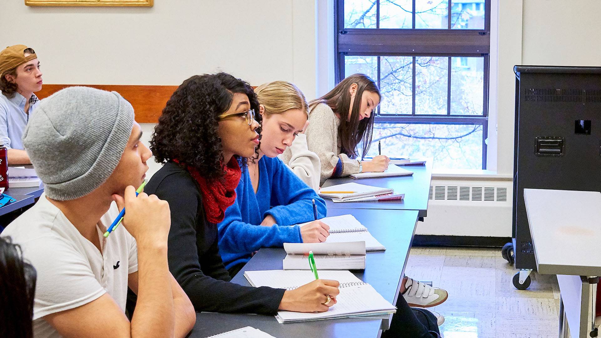 Students at desks in a classroom
