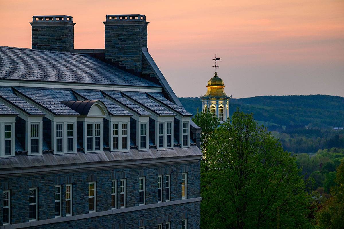 Sun sets over Chenango Hills and the Memorial Chapel