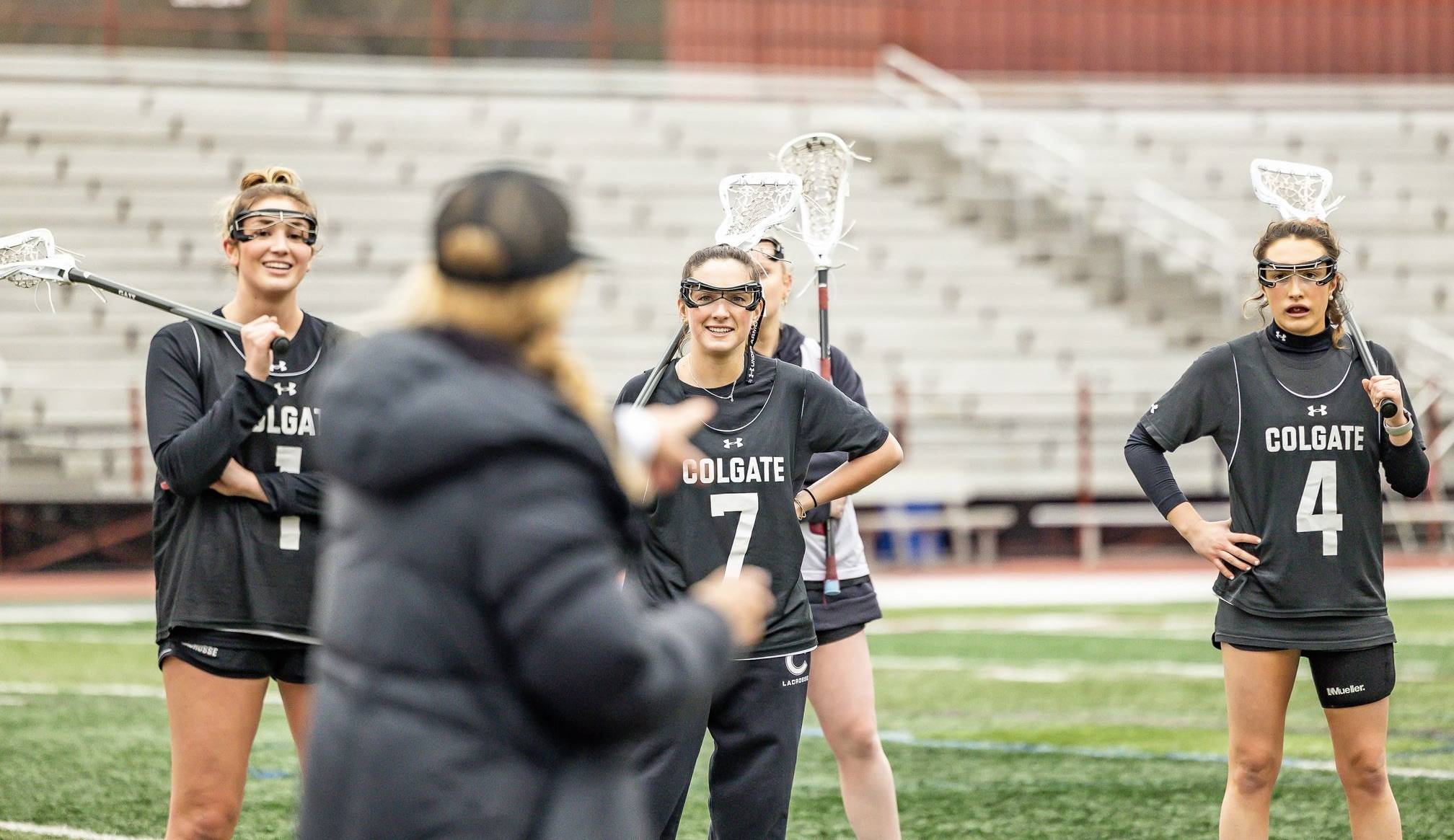 Gracie and teammates learning from their coaches