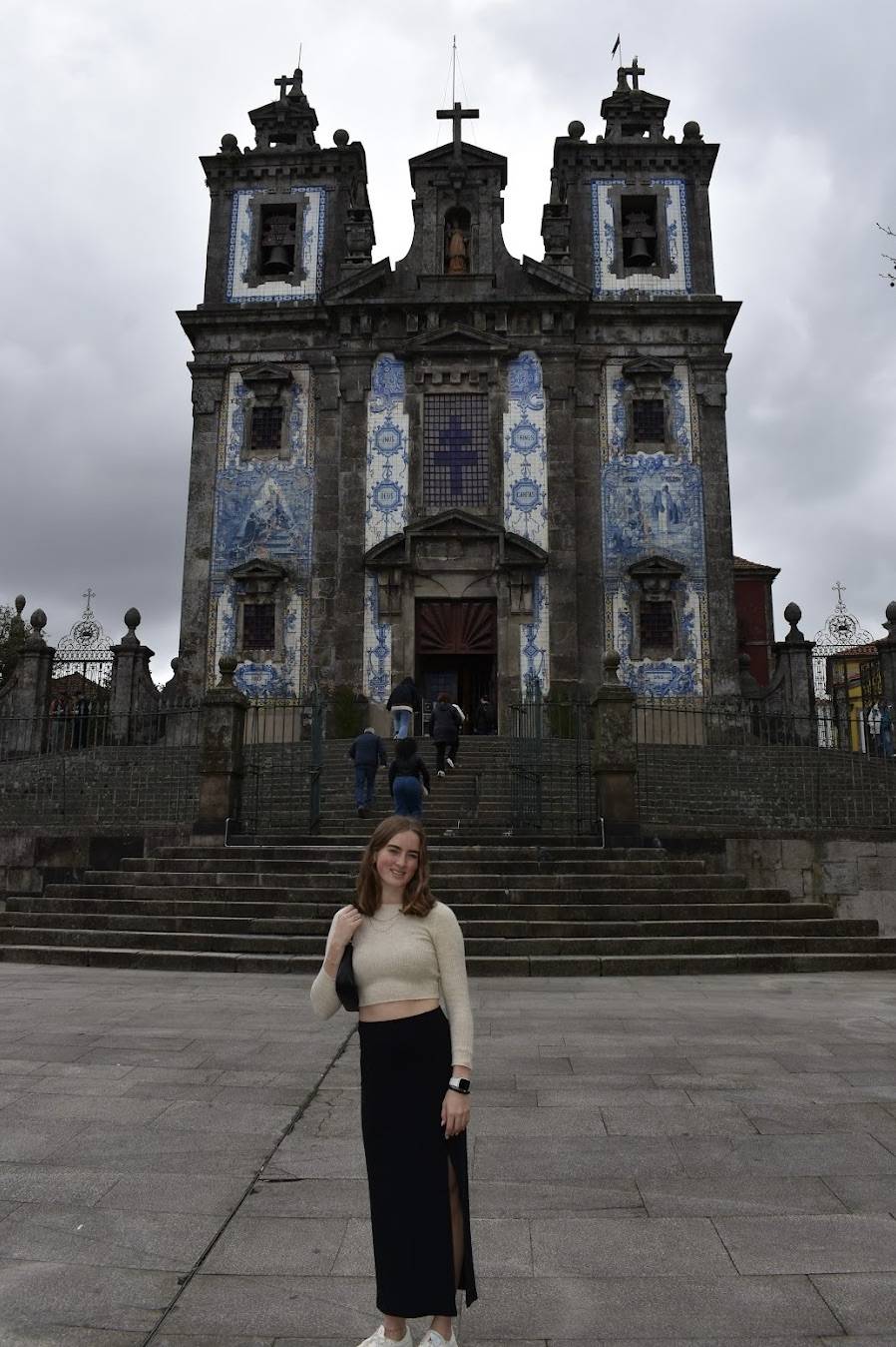Erin in front of the Church of Saint Ildefonso in Porto, Portugal during her AMS independent research project