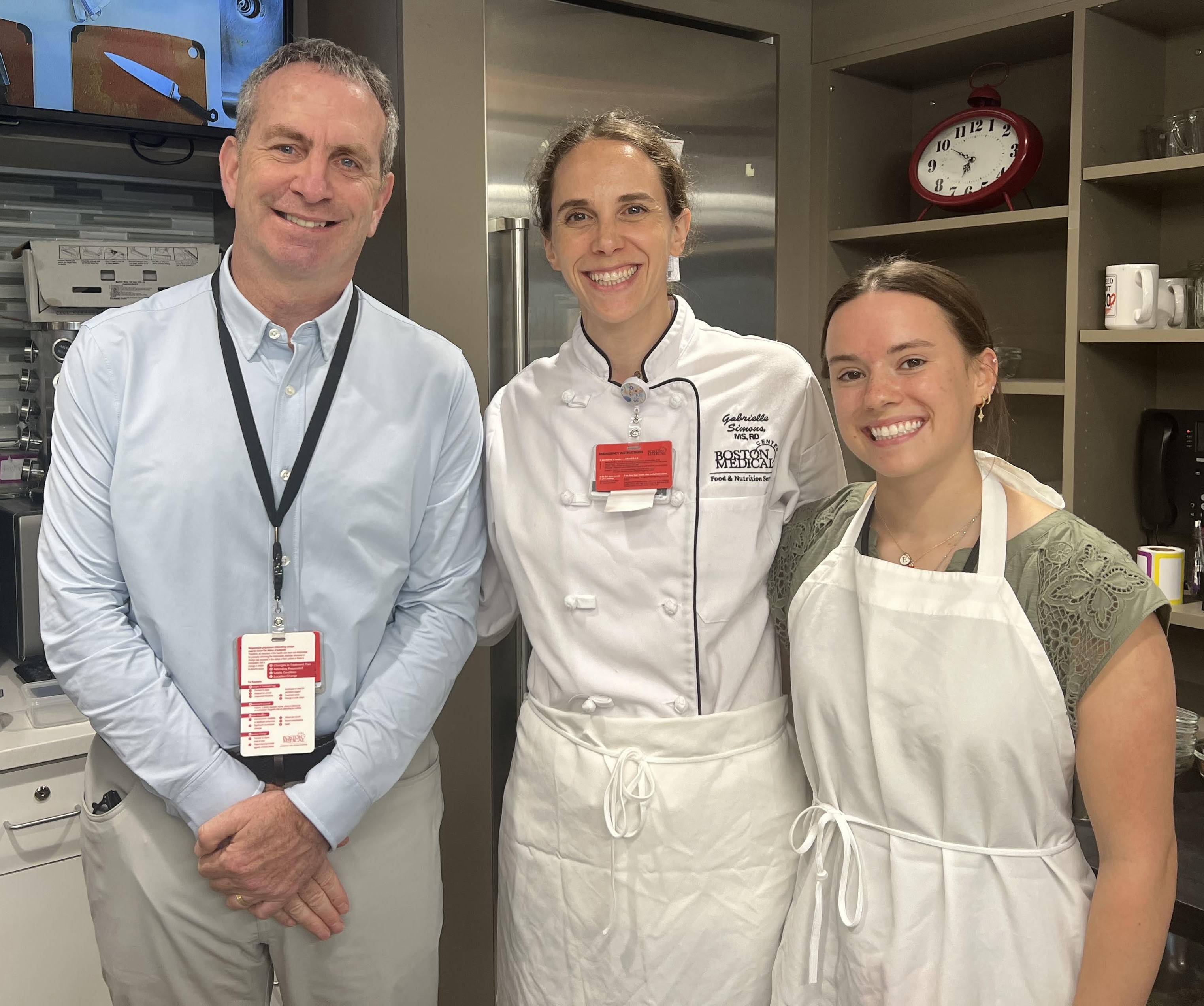 Julianna after a cooking class with the BMC president