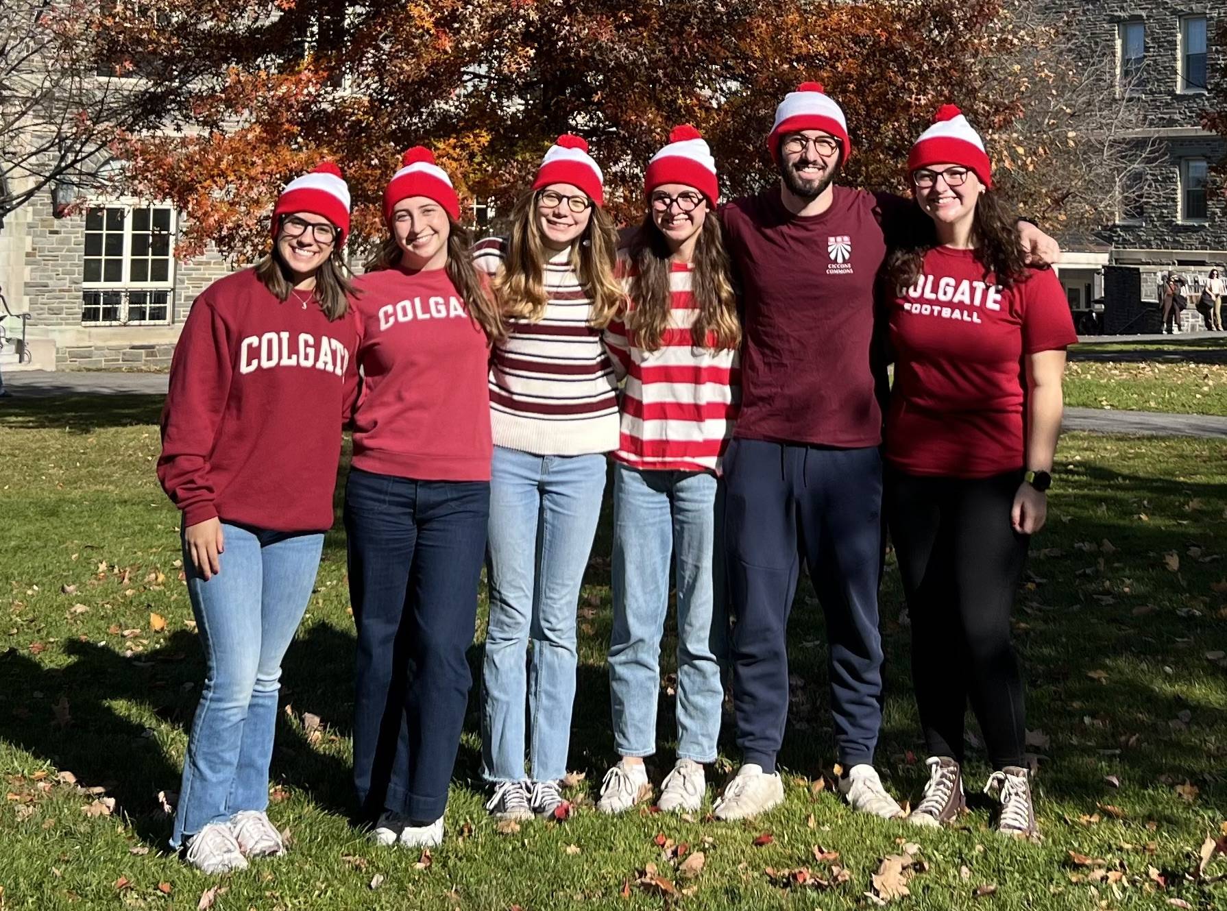 Julianna and friends on the academic quad dressed as Where’s Waldo for Halloween