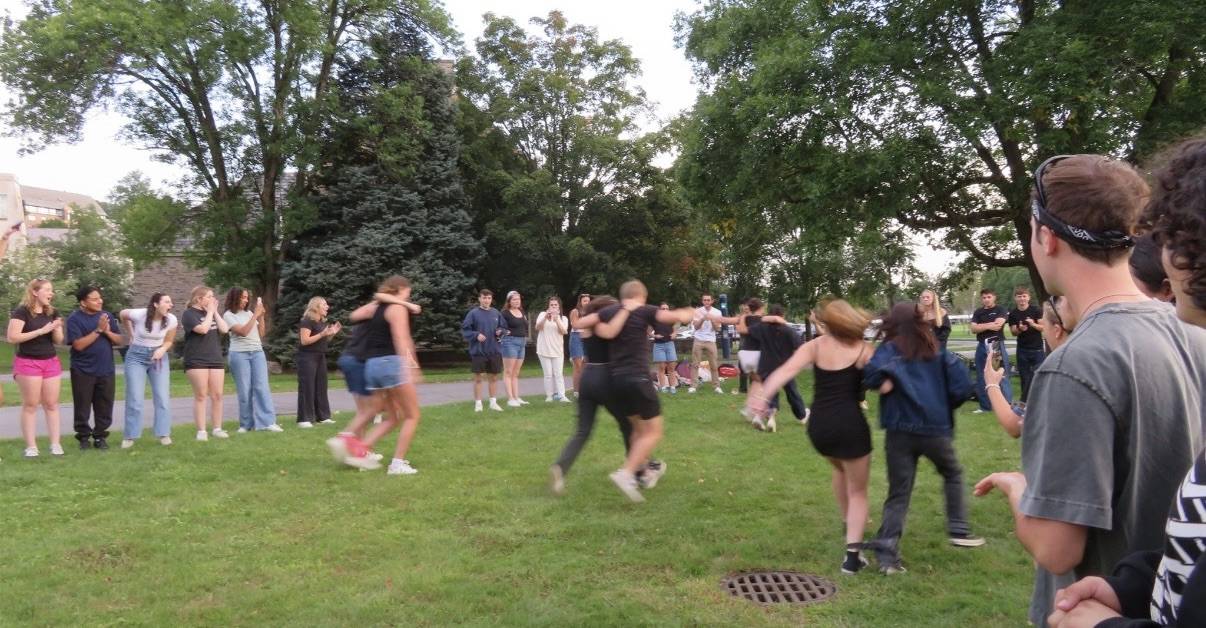 A three-legged race between some of the Link Staff members
