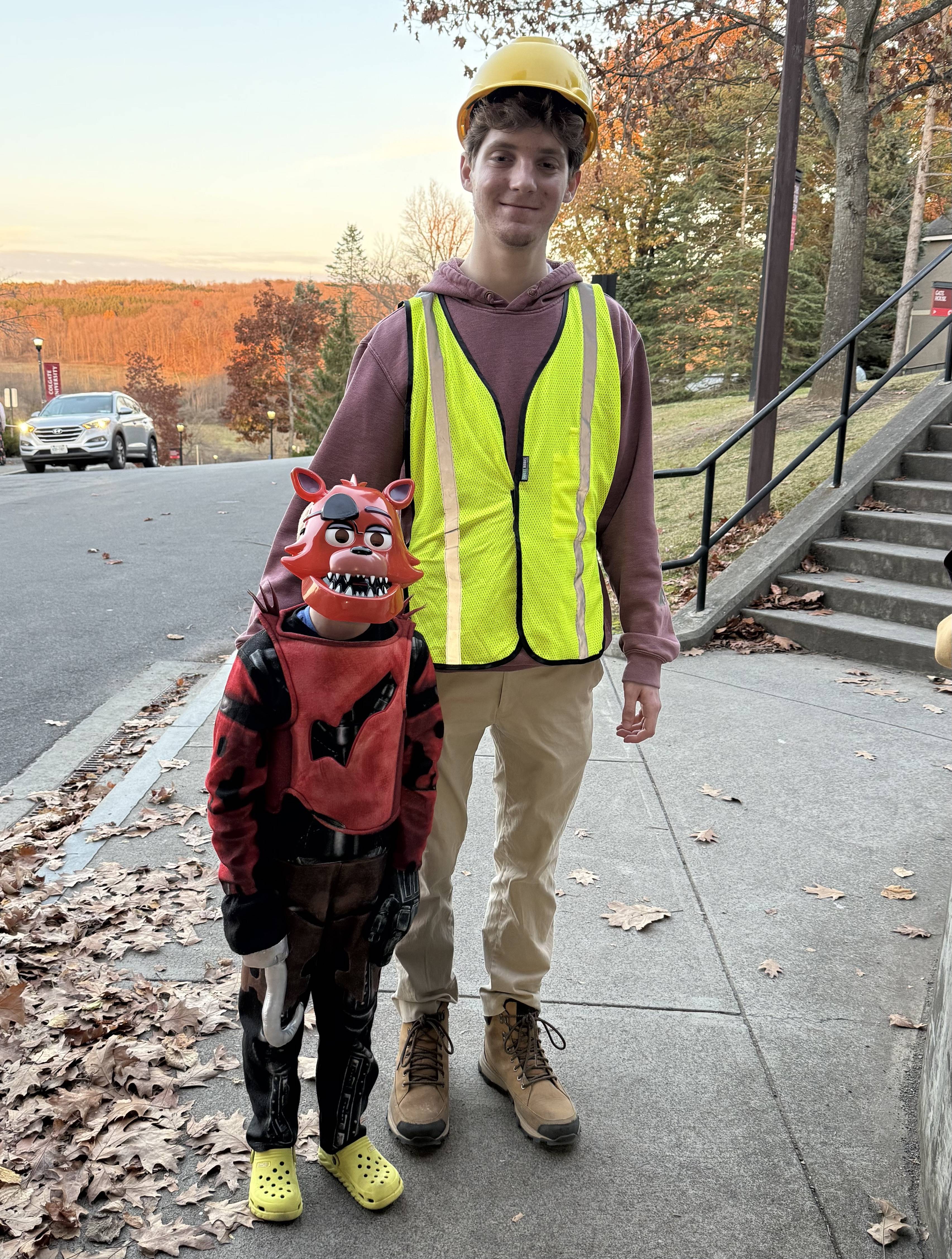 Garrett trick or treating with his Sidekick, Ansel