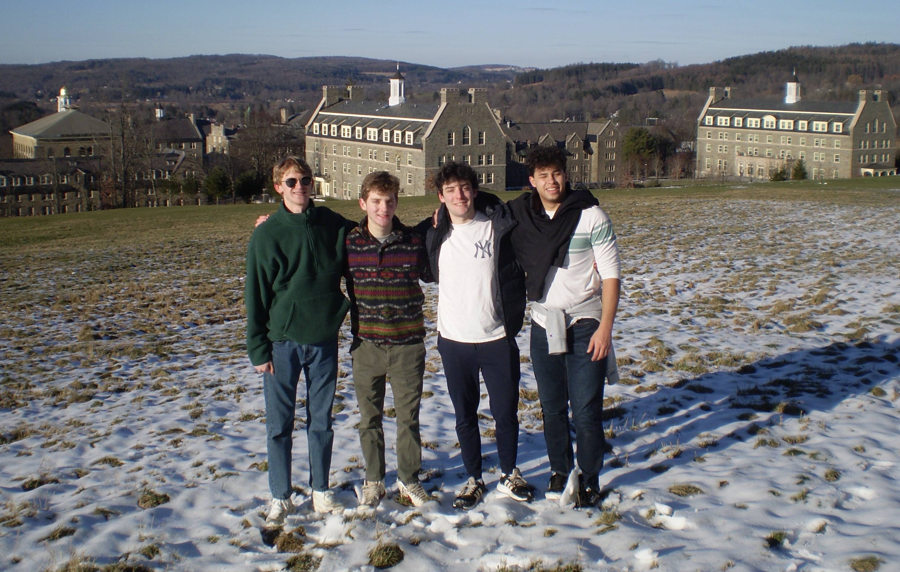 Garrett and friends enjoying the field overlooking campus