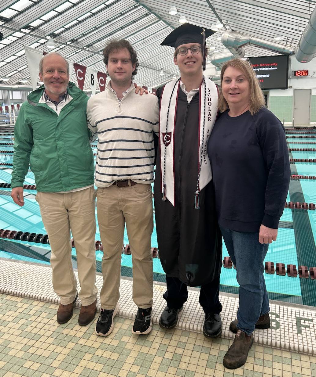 Luke and family at Lineberry Natatorium following graduation