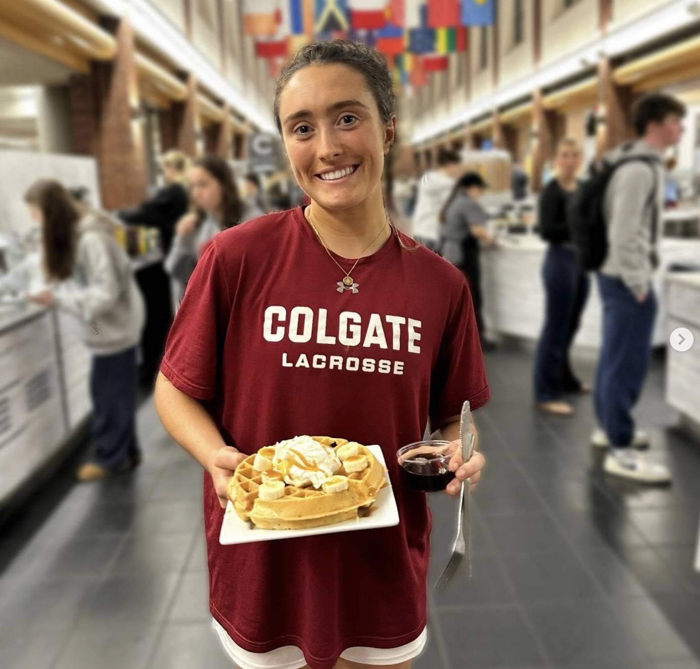 Gracie with a waffle she made to share with her friends in Frank Dining Hall