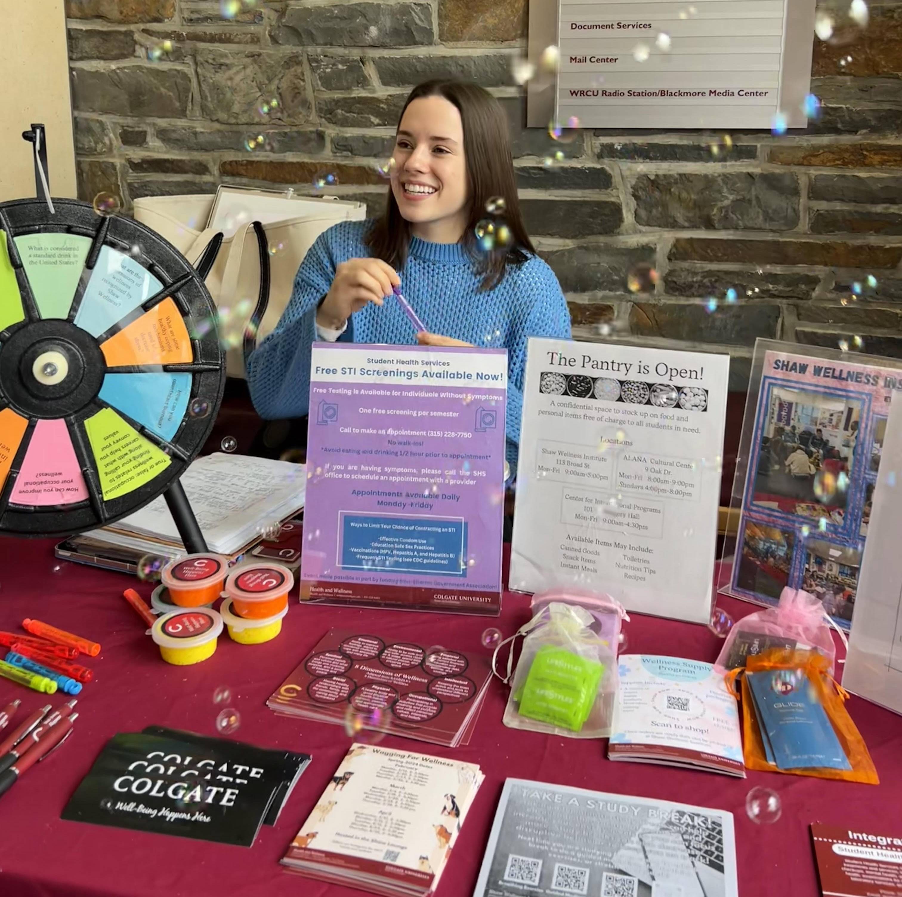 Julianna tabeling for Shaw at the Coop