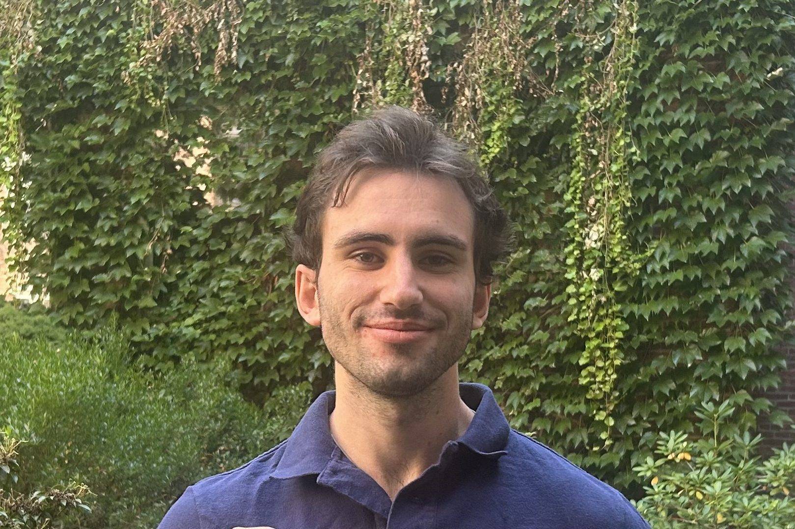 James Conrad poses for photo with his award