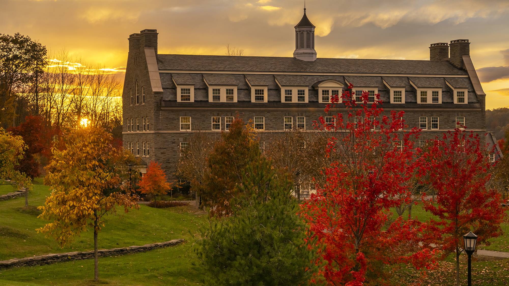 Sun sets behind Jane Pinchin Hall