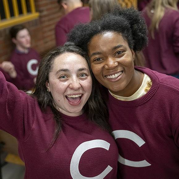 Two students pose for photo at Senior Night