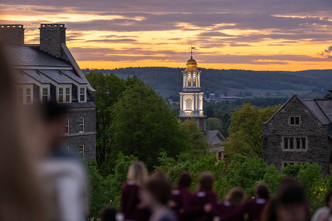 Students gather on the field of dreams to watch the sunset