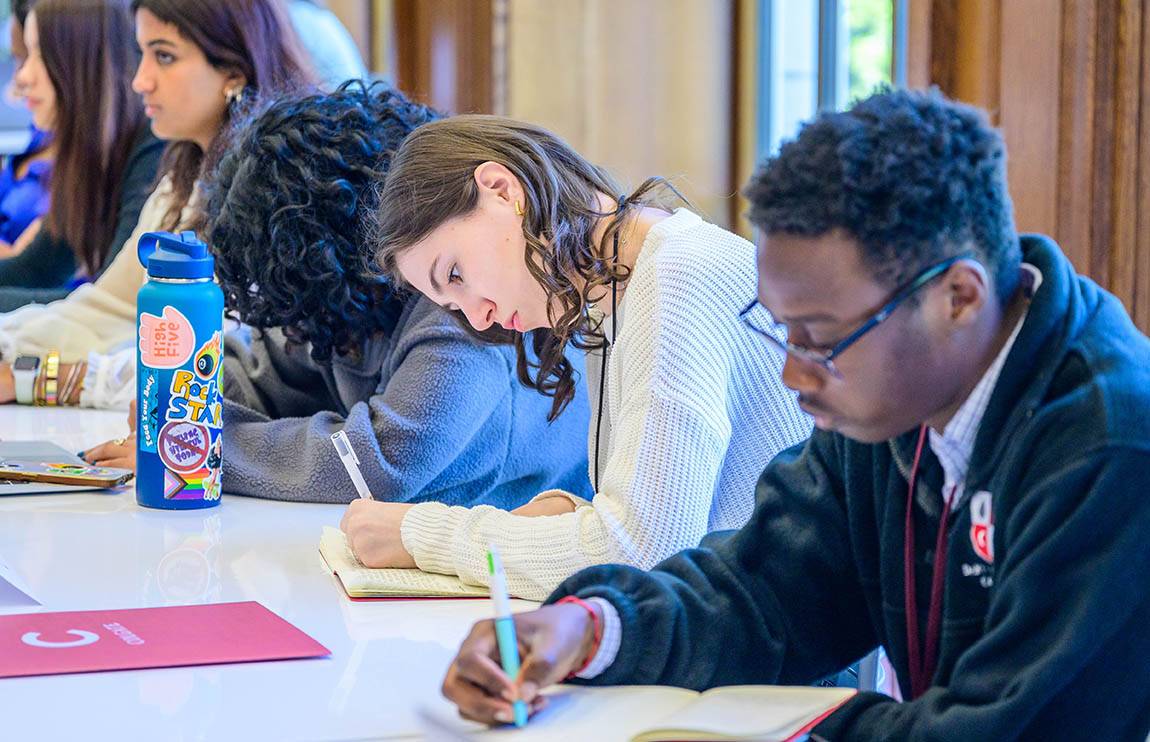 Students taking notes