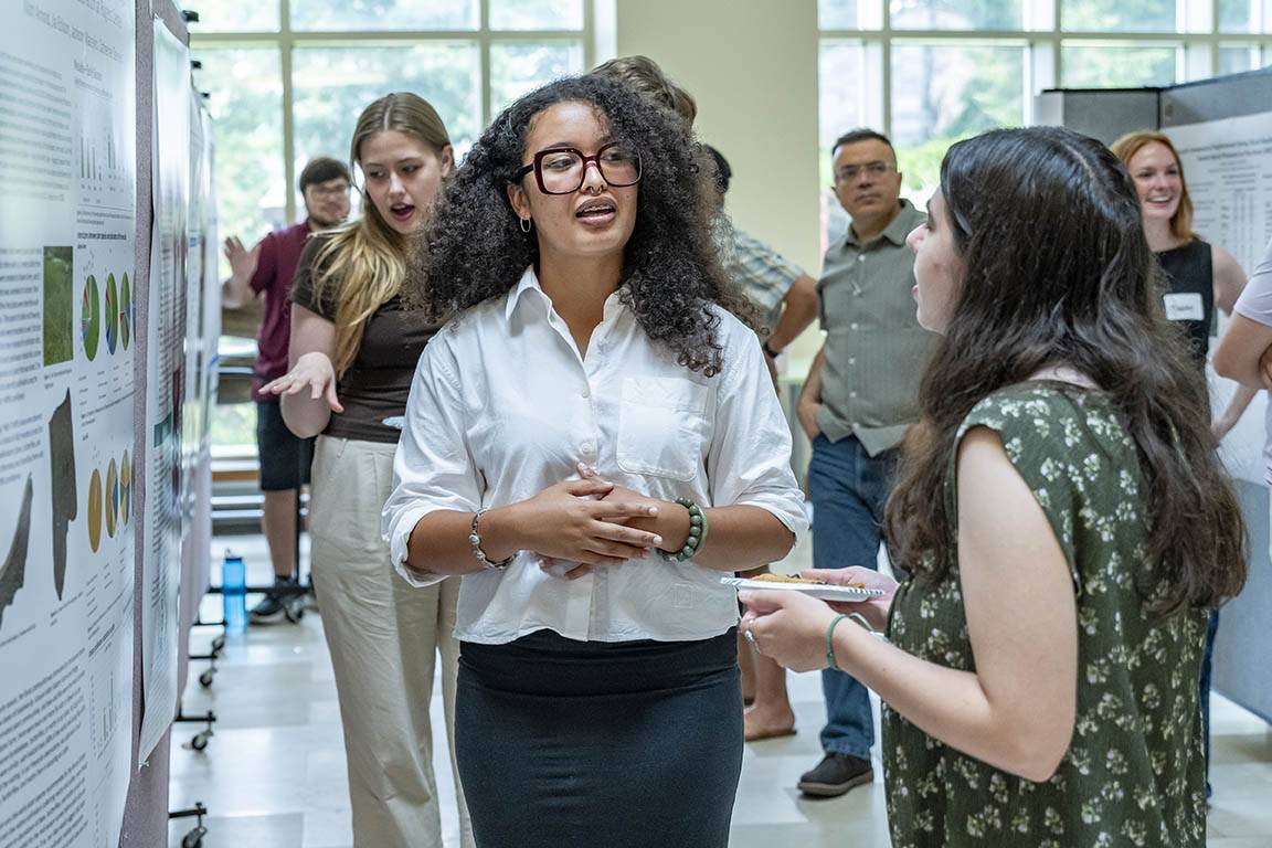 Students present their research posters