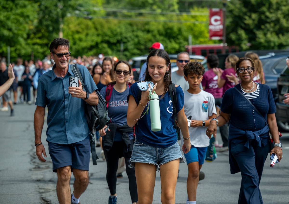 Family walking together on Colgate campus