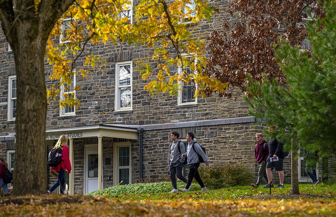Students walk through the academic quad