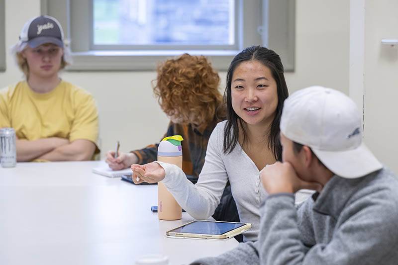 Students have group conversations in class