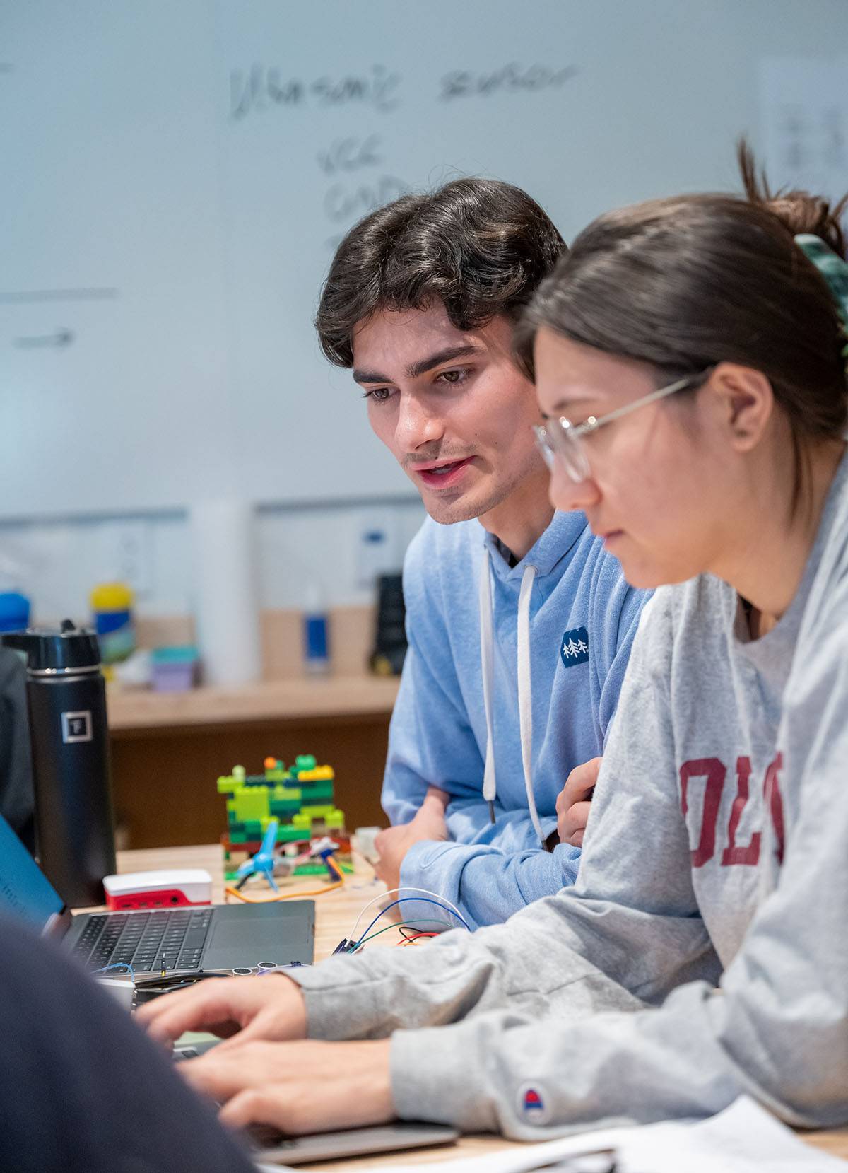 Two students in a computer science class