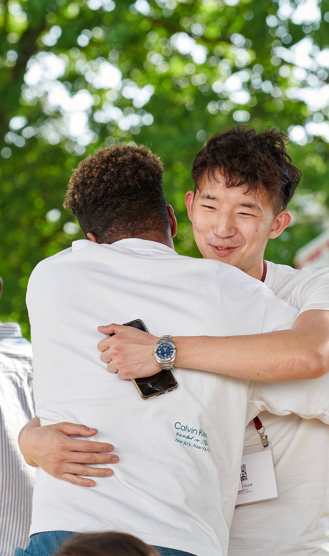Alumni hugging