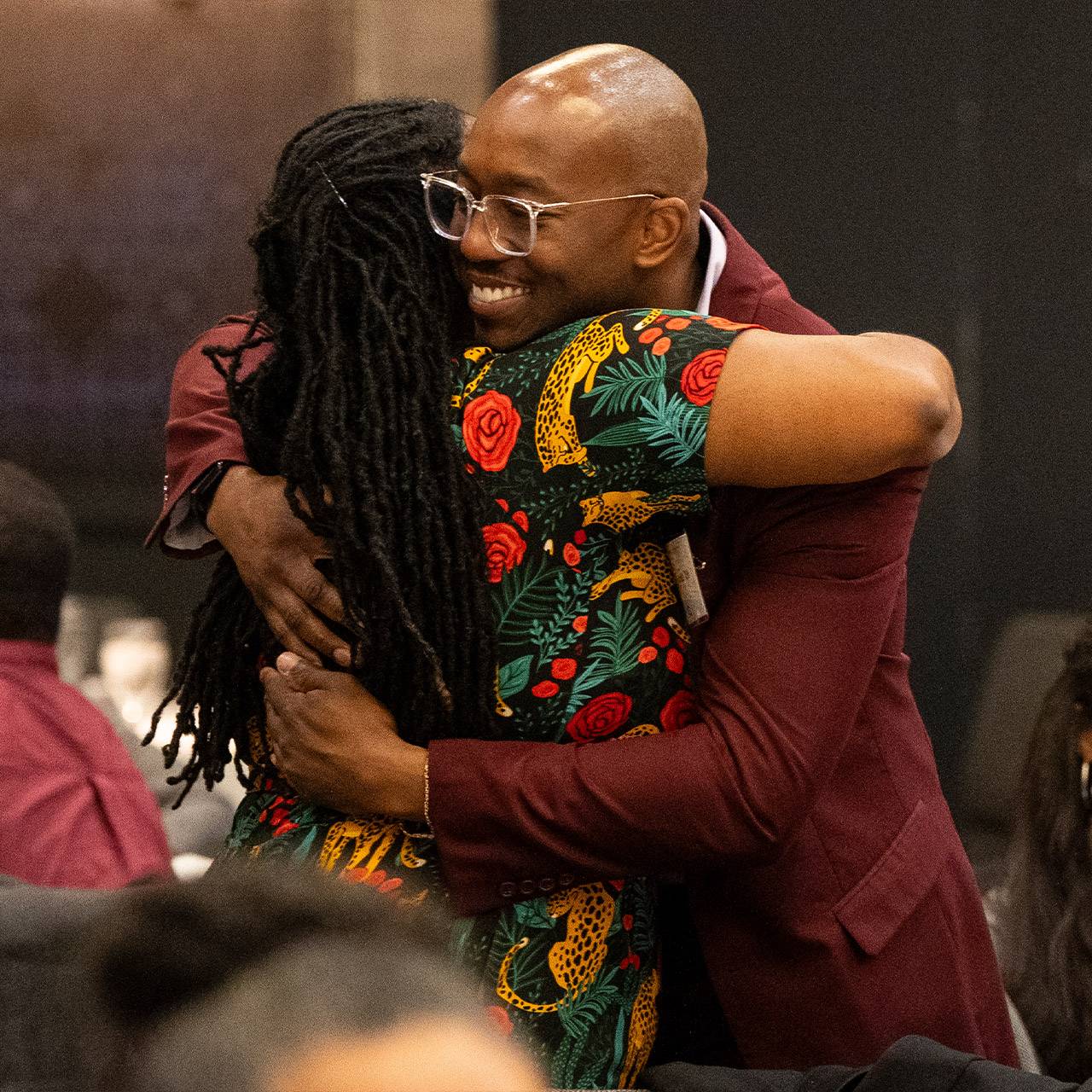 Alumni hugging