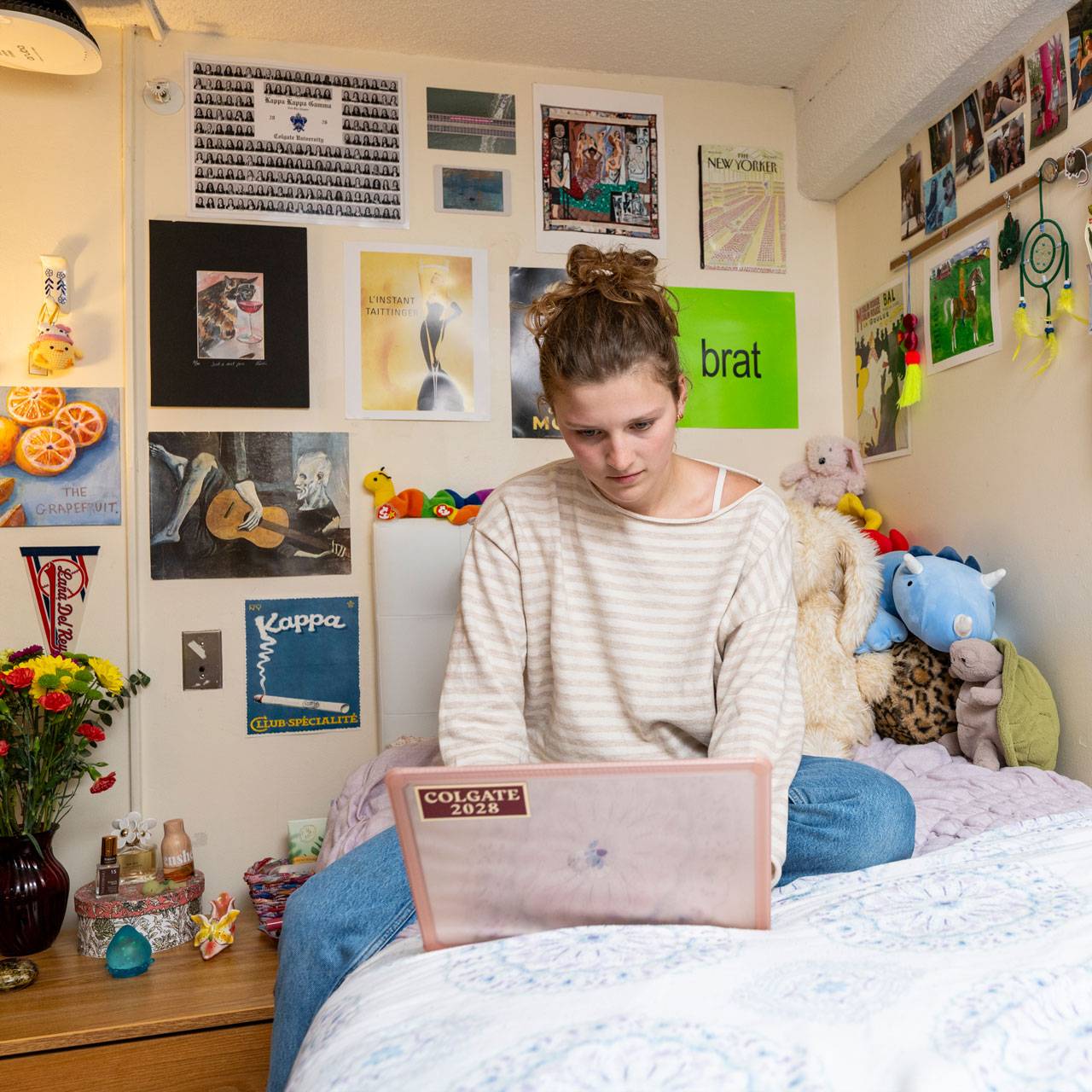 Student in their residence hall room.