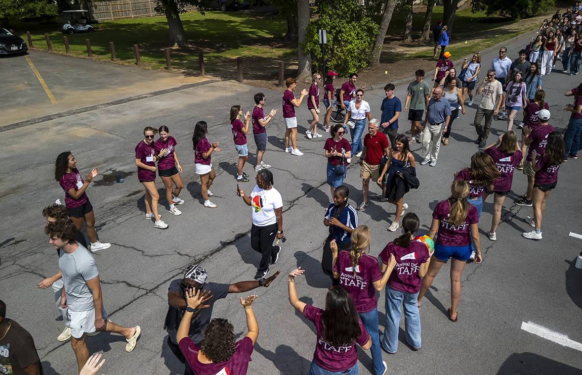 Parents and students are greeted during Arrival Day
