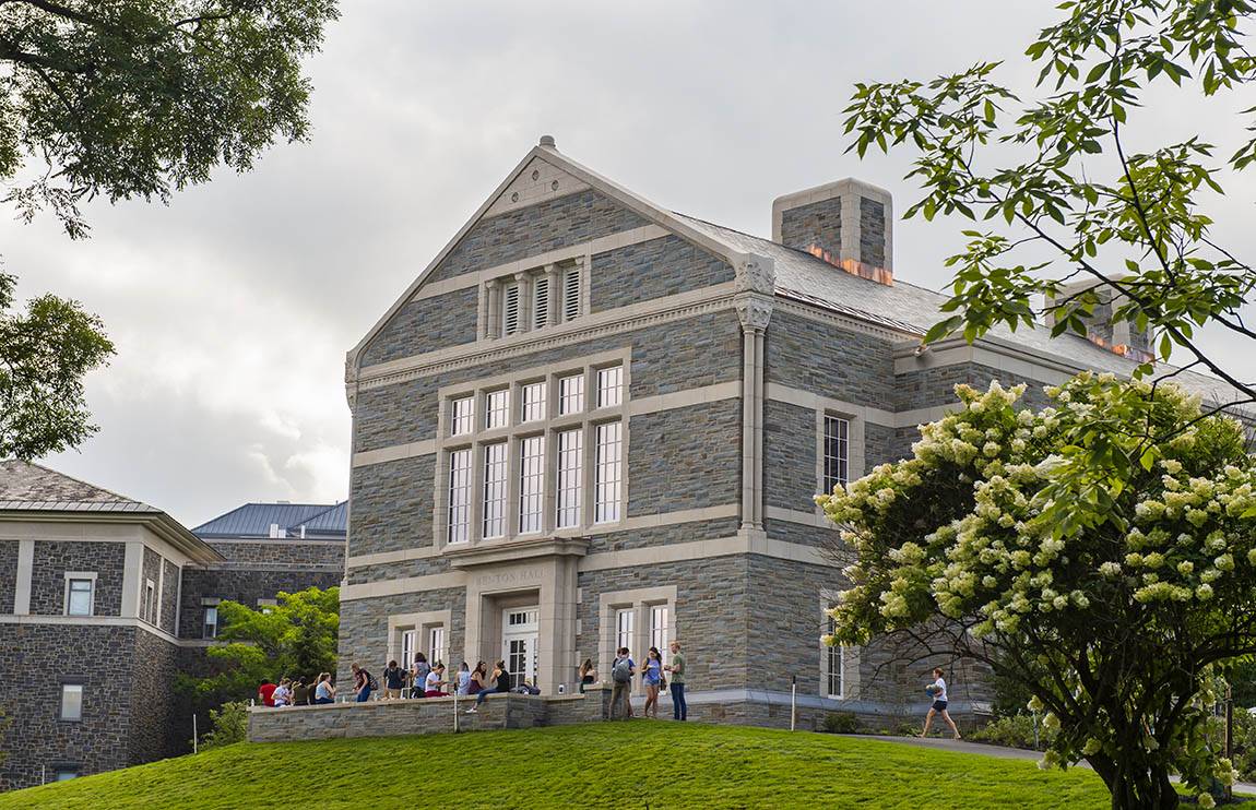 Students gather outside of Benton Hall