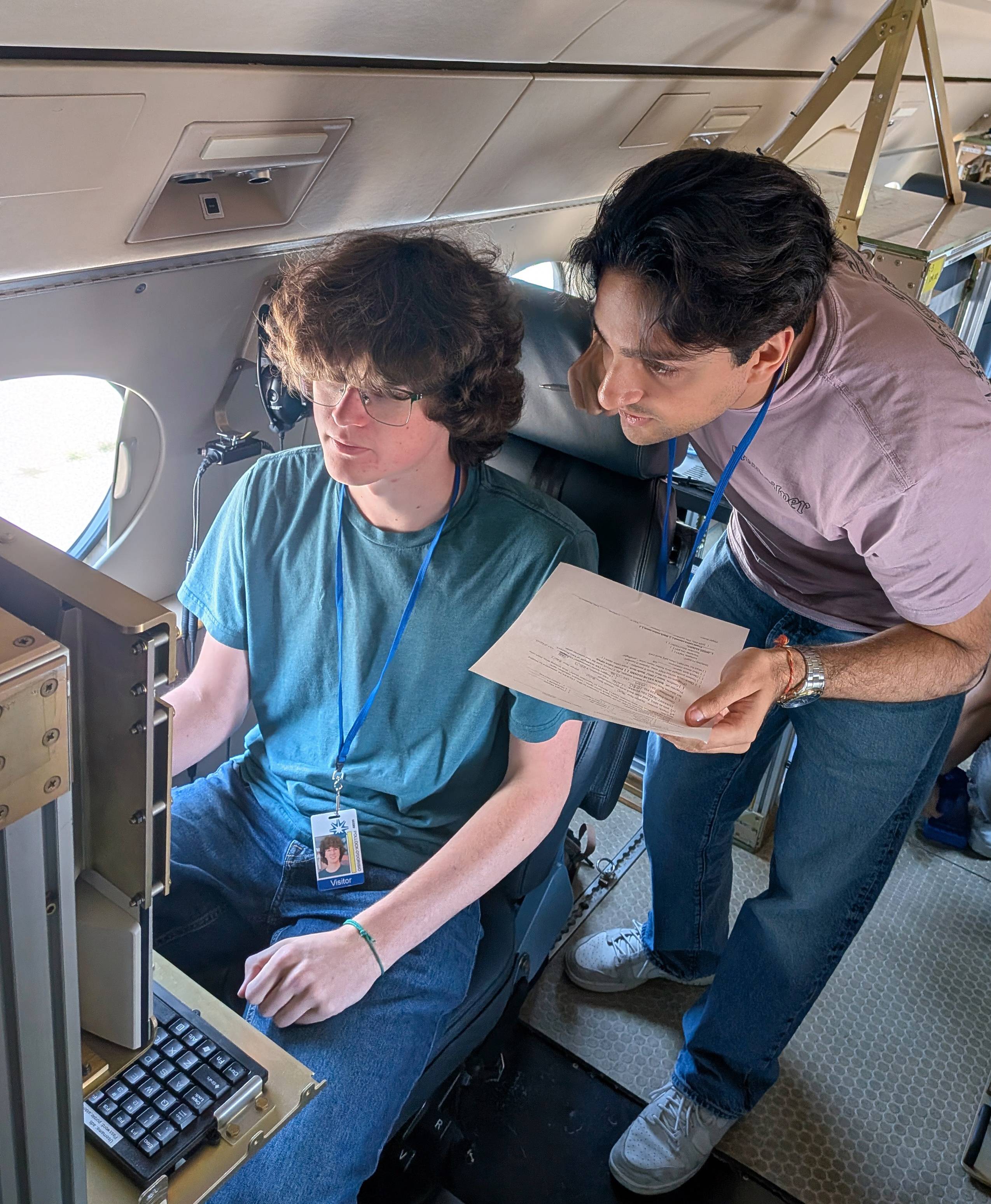 Gabe and Dev prepare the SP2 for a research flight