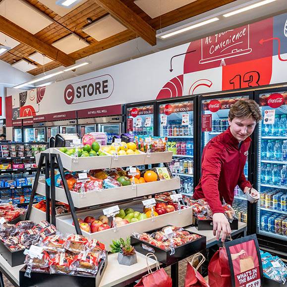 Student picks up item at the C-store