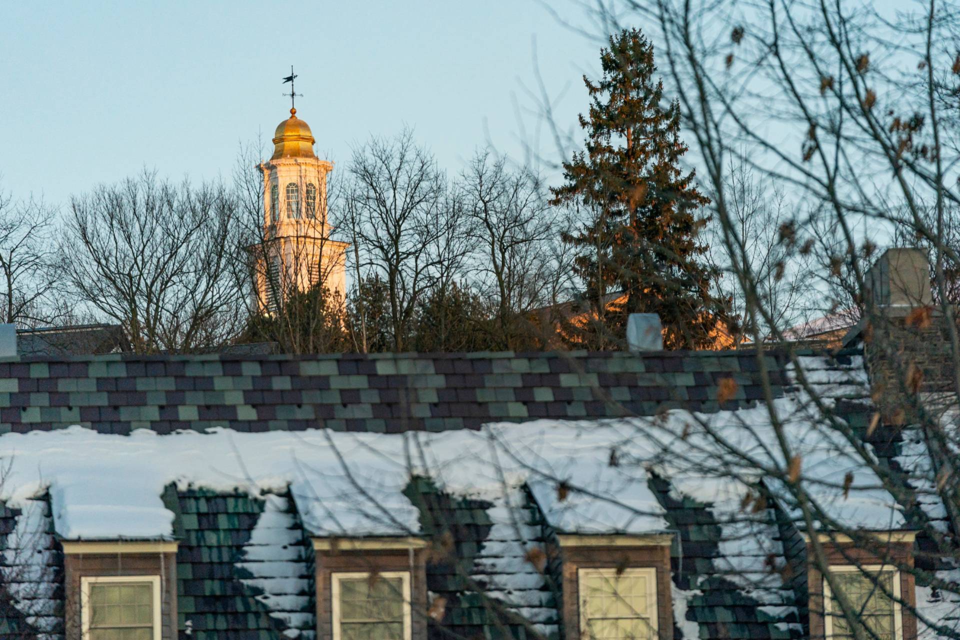 Sunset on the roof of James C. Colgate, with Memorial Chapel in the background