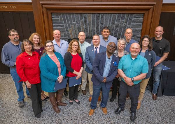 Group photo of the 2026 Colgate Service Award Honorees in the Hall of Presidents