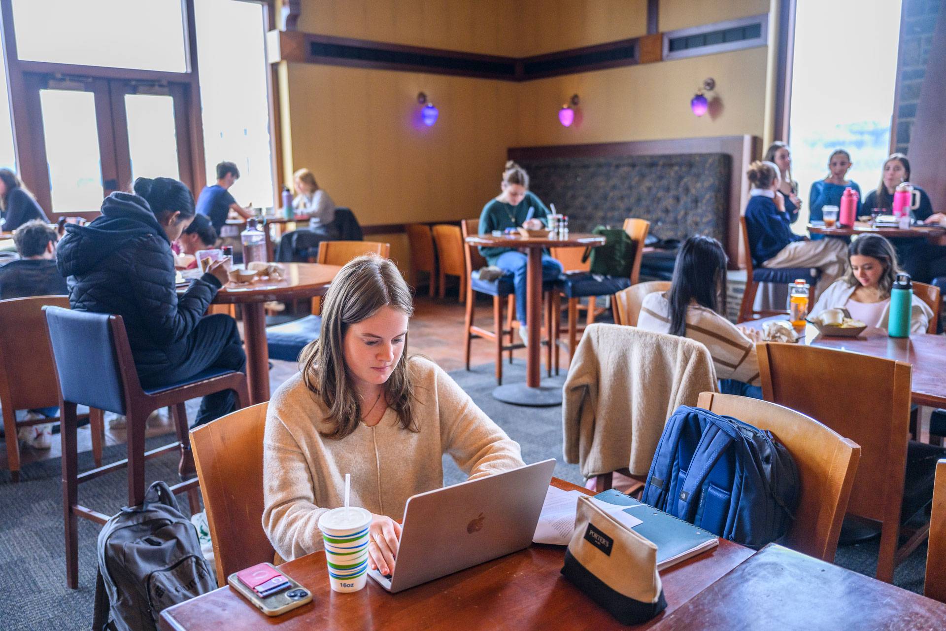 Colgate students sit at tables in The Coop during lunch, April 24, 2024.