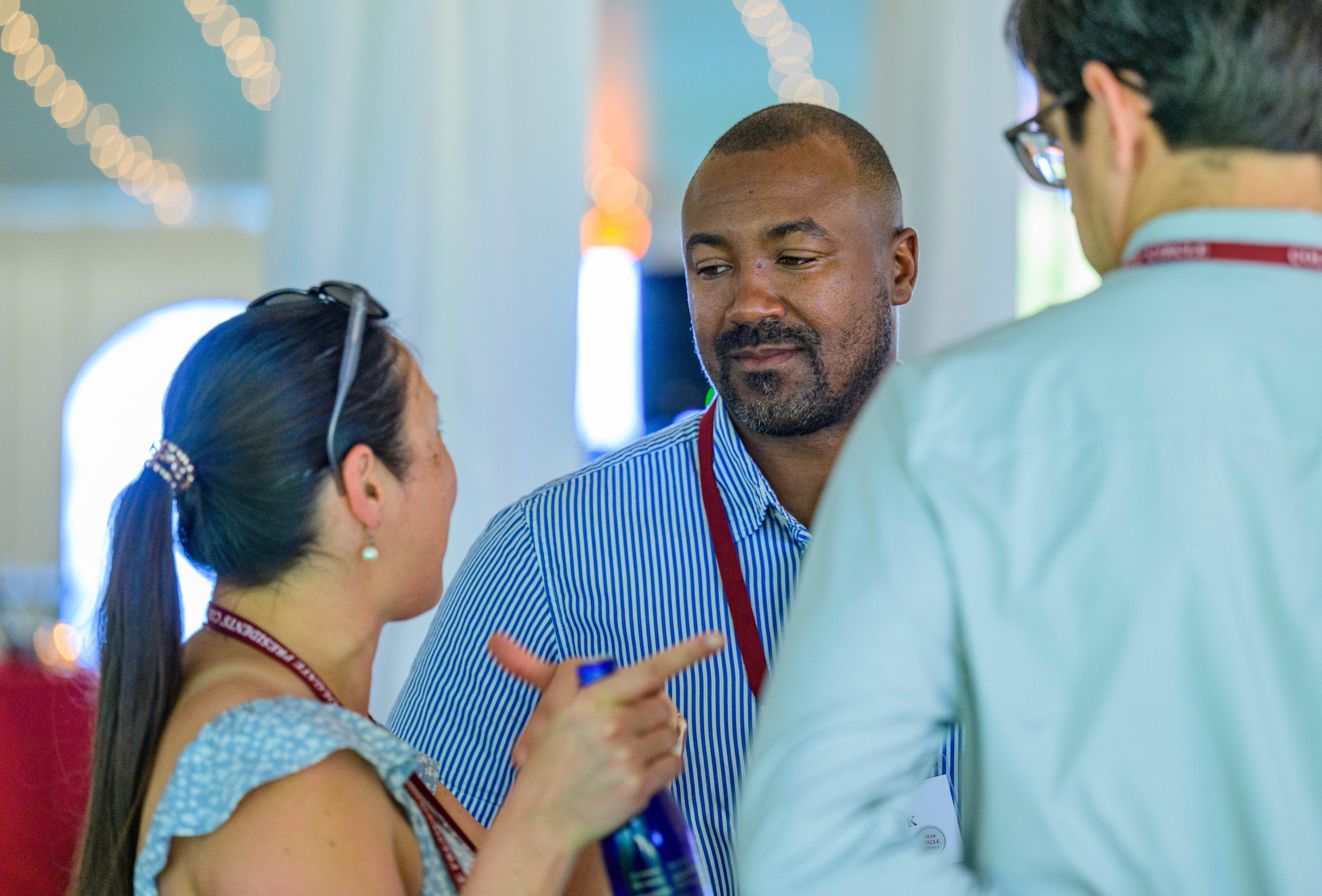 Justin Polk '03 and other attendees enjoy Reunion