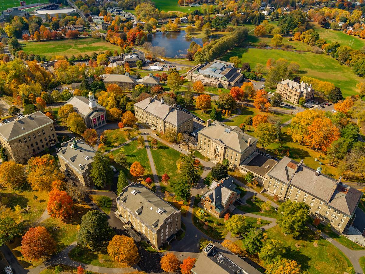 Aerial view of campus with fall foliage.