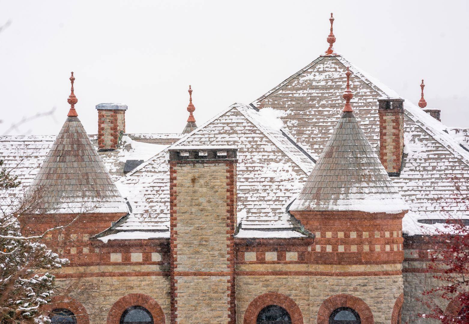 Snow on the rooftop of James B. Colgate Hall