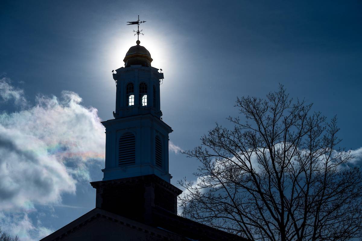 Sun behind Colgate chapel tower