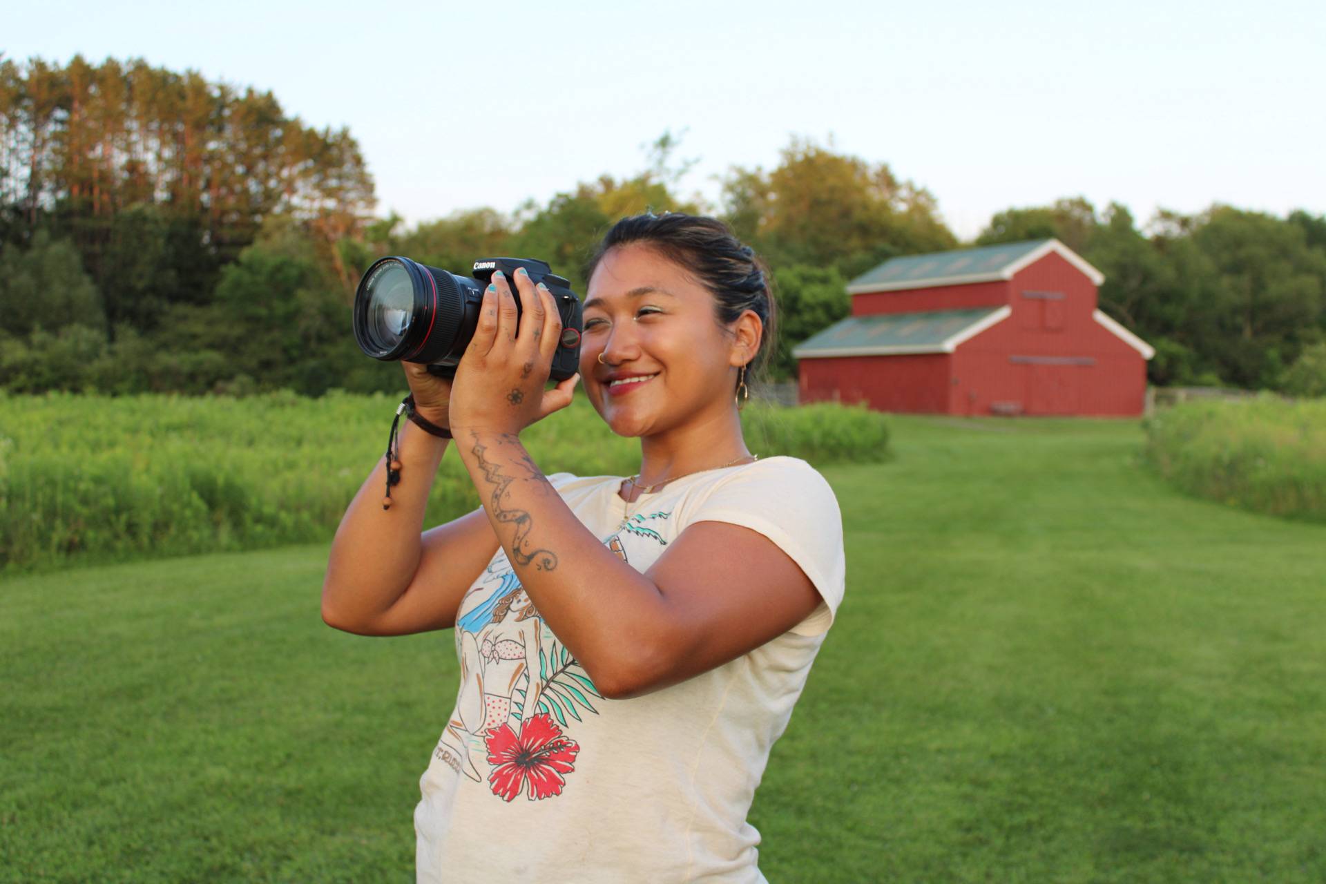 Juny Ardon takes a photo at Camp Fiver