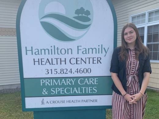 Ekaterina Balsan in front of Family Health Center in Hamilton, N.Y.