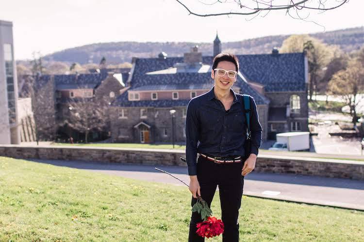 Bobae Kang on the hillside with James C. Colgate Hall in the background