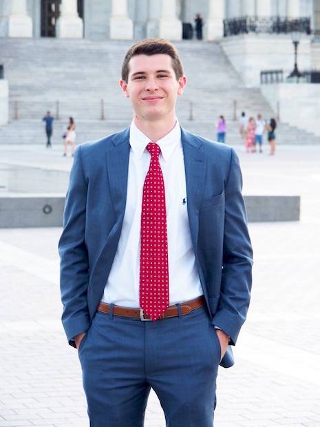 Eli Cousin in a suit in Washington, D.C.