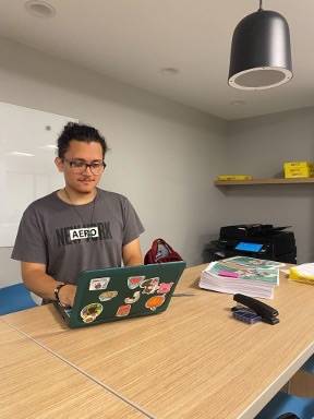 Fredy Alvarado-Retana working at computer.