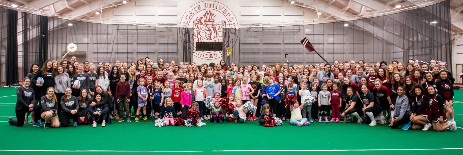 Colgate Women's Athletic teams with local school children