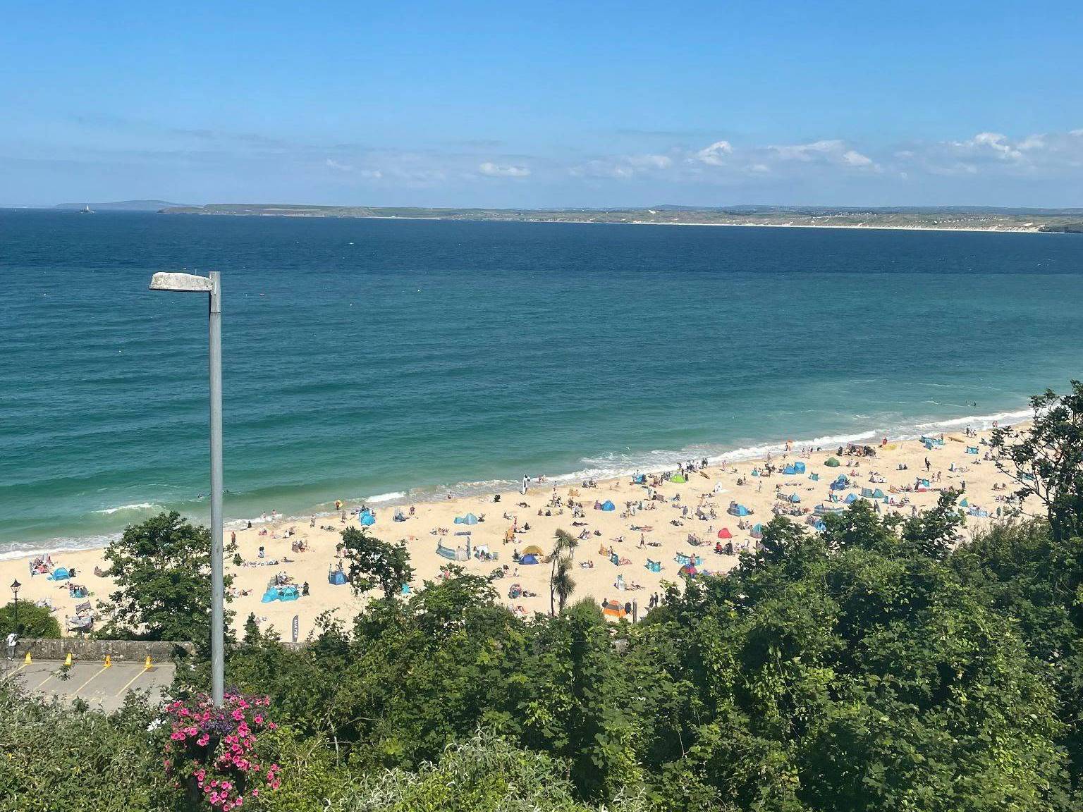 A crowded beach in St. Ives, Cornwall. June 22, 2021.