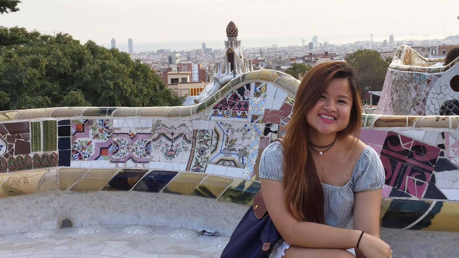 Phuong Mac seated in front of a city skyline