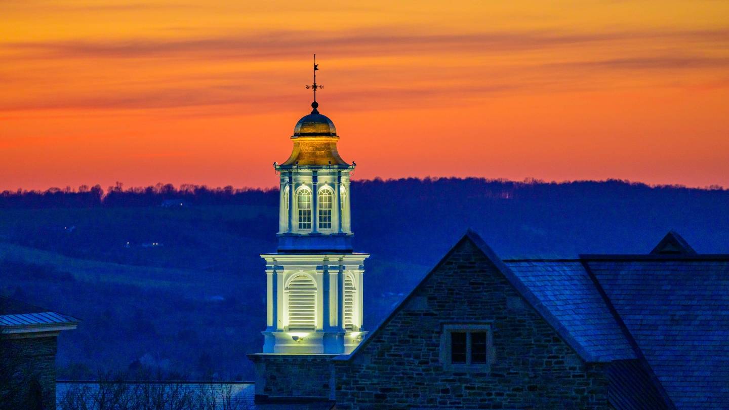 Photo of night sky with the Chapel in picture.