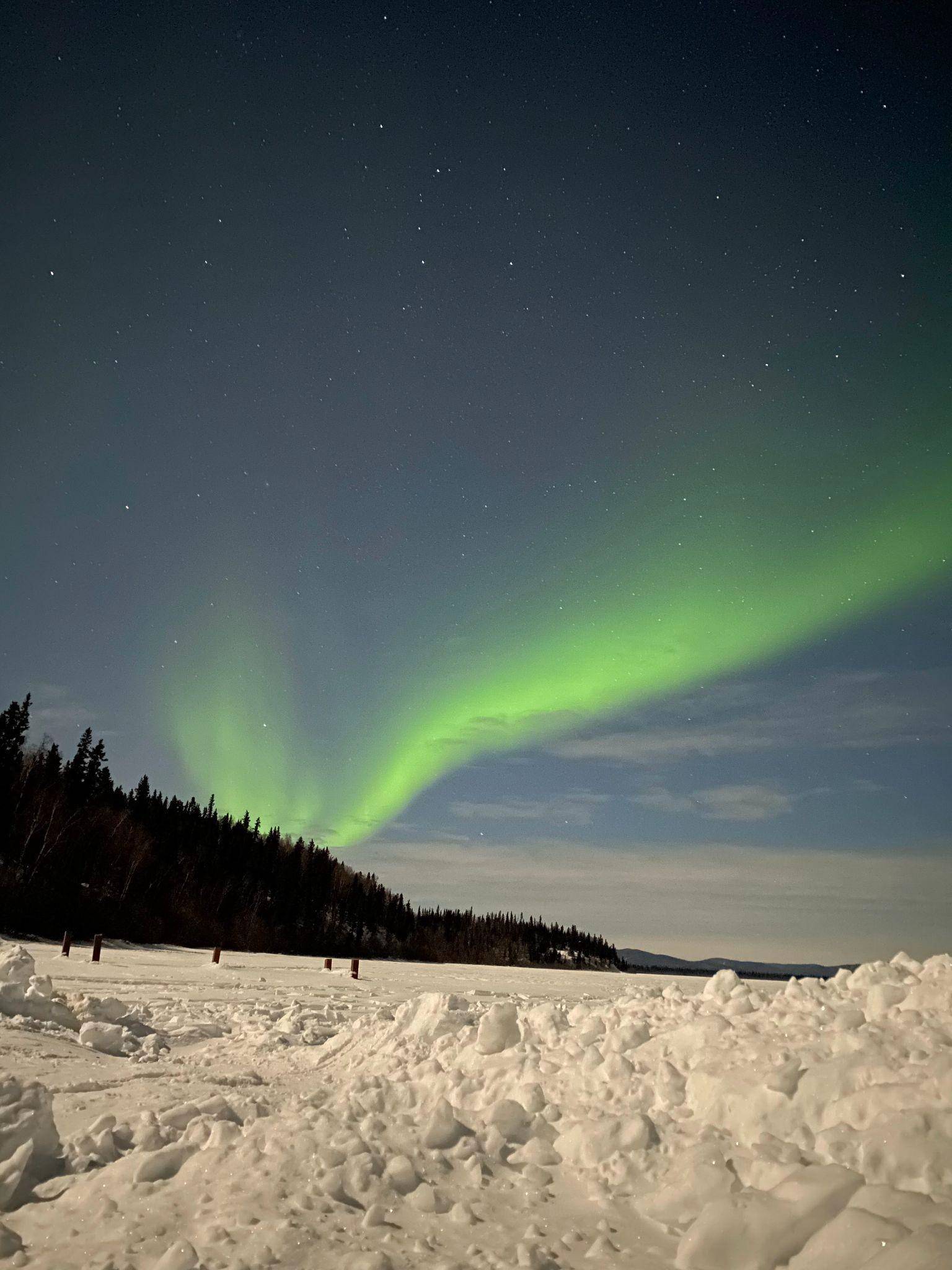 The Auroras over a frozen lake