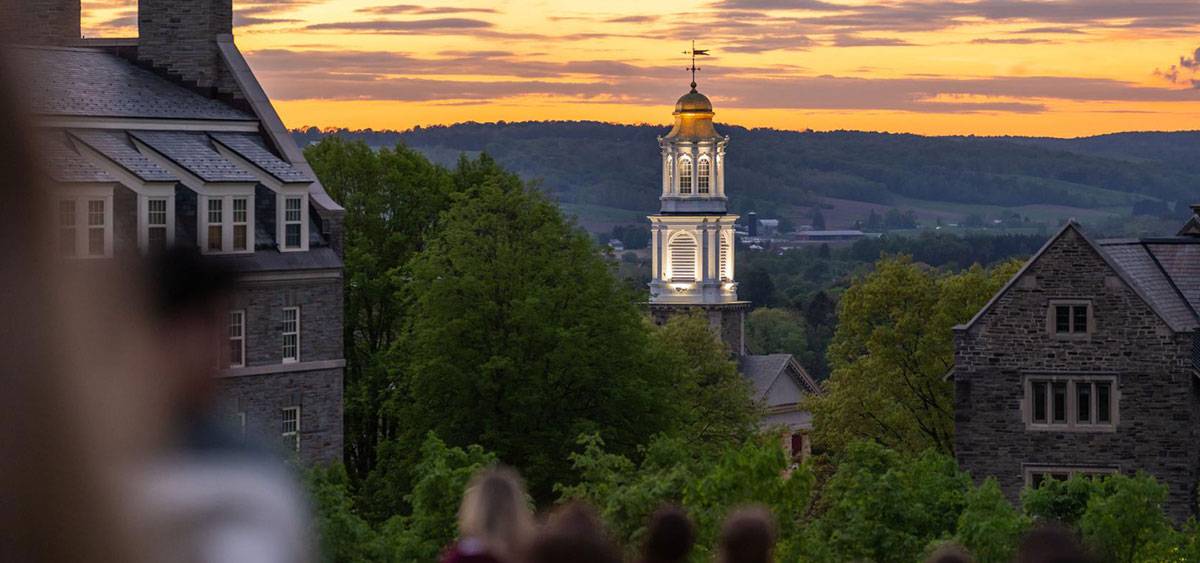 Seniors overlook the hill at sunset